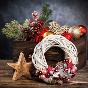 Christmas ornaments in a wooden crate