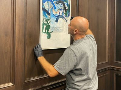 Wall Hanging Service: An End-to-End Safety Guarantee for Your Art