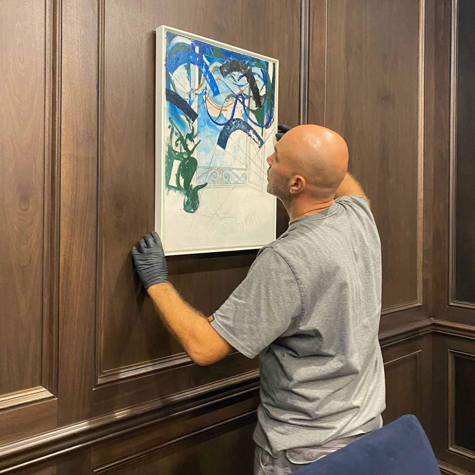 Wall Hanging Service: An End-to-End Safety Guarantee for Your Art