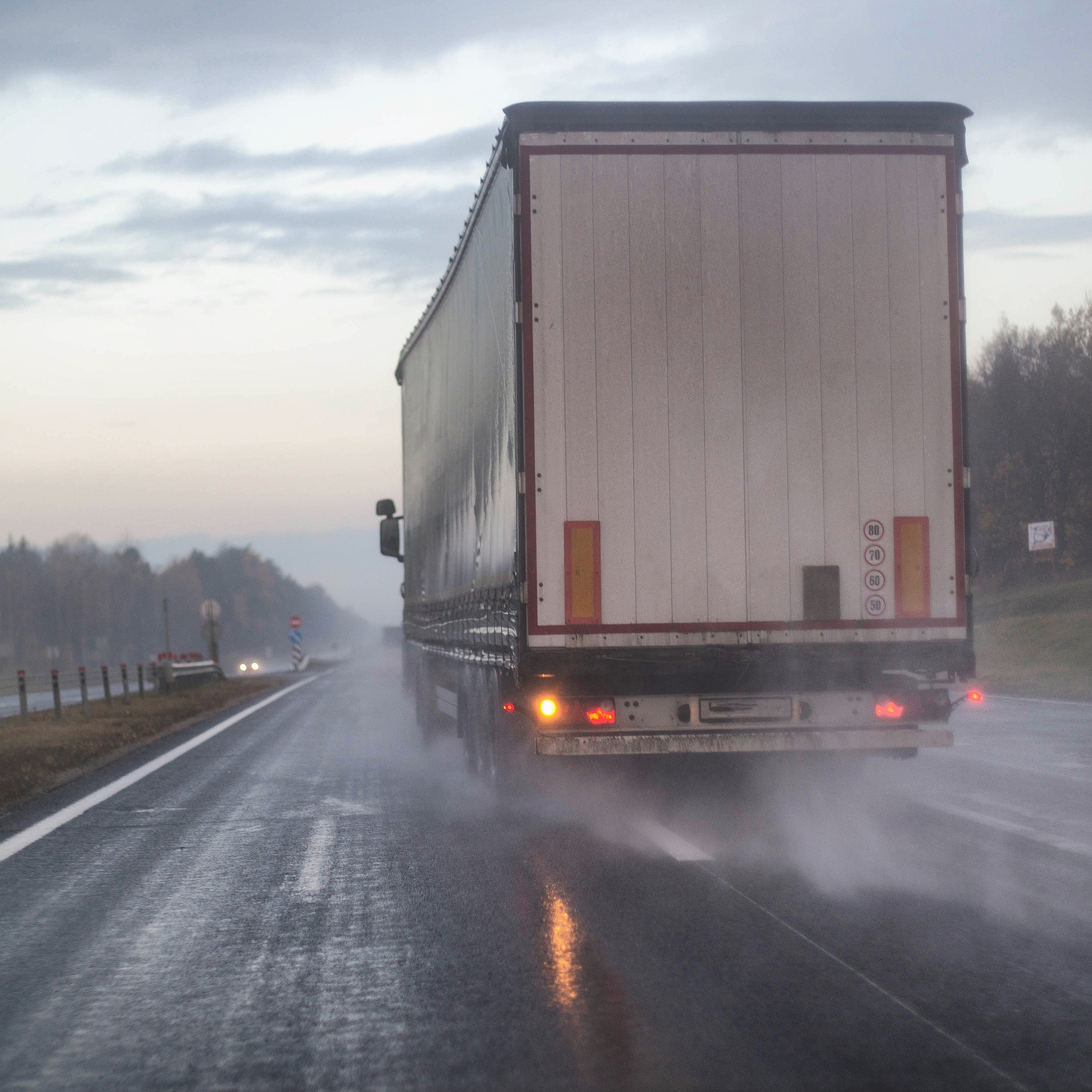 Can Truck Drivers Be Liable for Crashes on Wet Roads?